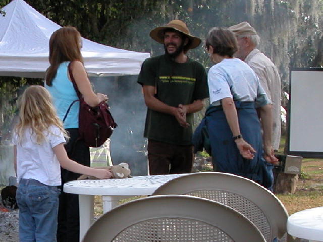 Guests gather under the tent at the Slow Food dinner and tour