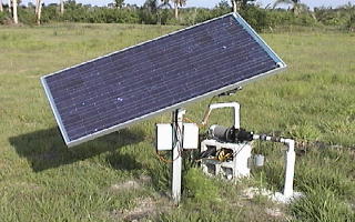 Solar panel on a tracking mount powering the farm well